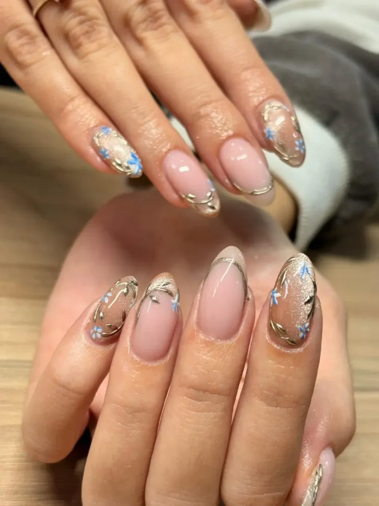 Gold and blue botanical nail art